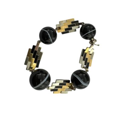 GOLD AND SARDONYX BRACELET
18k (750 thousandths)...