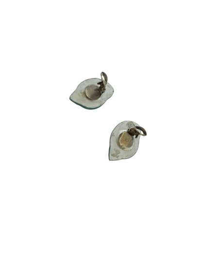 SHELL EAR CLIPS 
Two turquoise glazed earthenware...