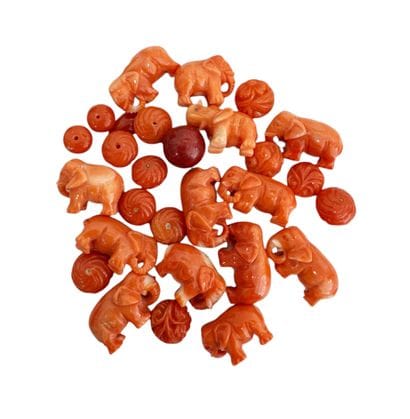 CORAL BEADS AND ELEPHANTS 
Lot of coral beads...