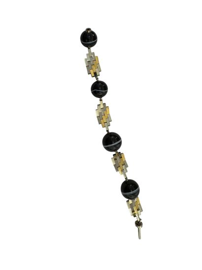 GOLD AND SARDONYX BRACELET
18k (750 thousandths)...