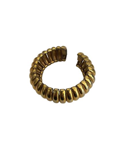 GILDED METAL CUFF BRACELET 
Gilded metal...