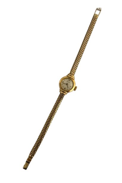 THISY
Ladies' wristwatch in 18k (750 thousandths)...