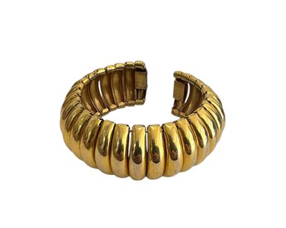 GILDED METAL CUFF BRACELET 
Gilded metal...