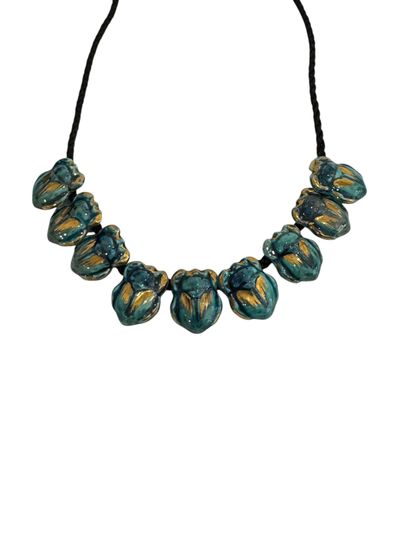 SCARABEES NECKLACE 
Necklace of 9 turquoise-glazed...