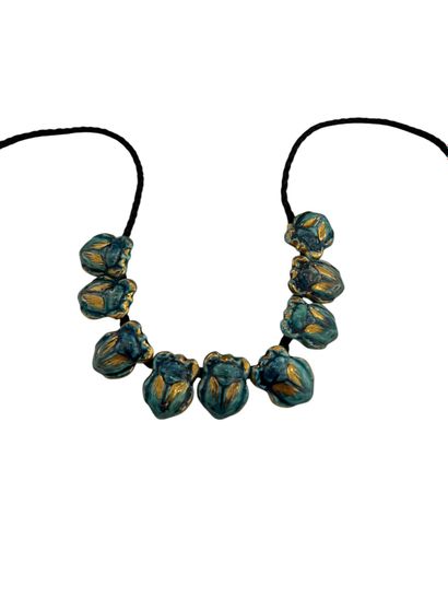 SCARABEES NECKLACE 
Necklace of 9 turquoise-glazed...