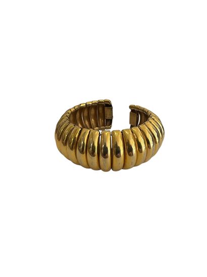 GILDED METAL CUFF BRACELET 
Gilded metal...