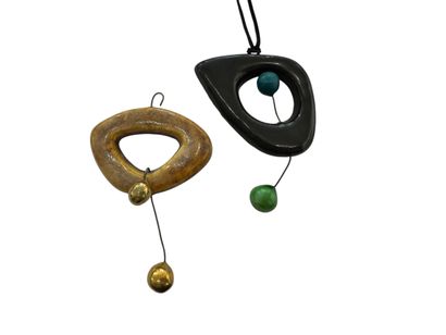 ACCOLAY 
Black-glazed earthenware pendant...