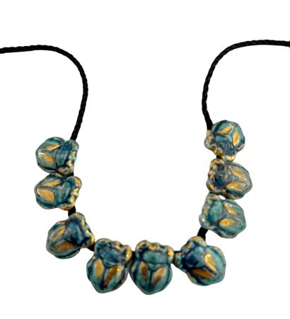SCARABEES NECKLACE 
Necklace of 9 turquoise-glazed...