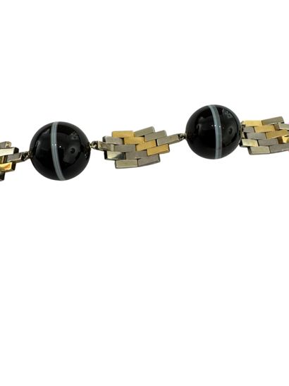 GOLD AND SARDONYX BRACELET
18k (750 thousandths)...