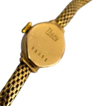THISY
Ladies' wristwatch in 18k (750 thousandths)...