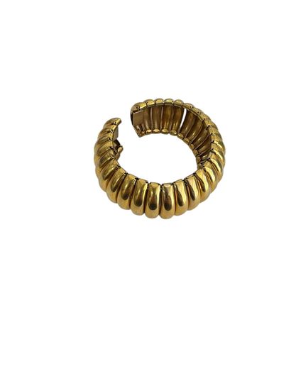 GILDED METAL CUFF BRACELET 
Gilded metal...