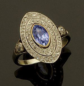 Bague en or gris 18K(750/oo) et platine (850/oo)...