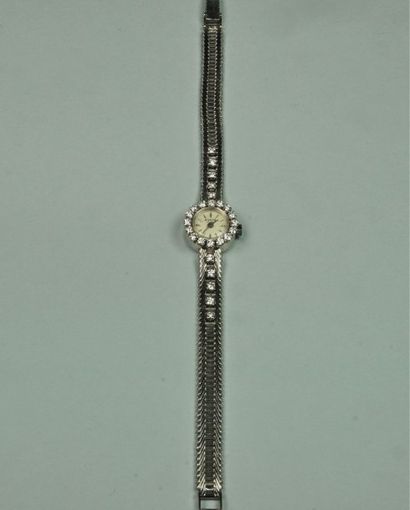 AUGIS
Montre de dame en or gris 18K (750/oo),...
