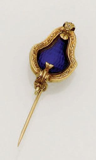 Épingle en or jaune 18K (750/oo) à décor...