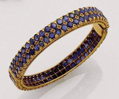 Bracelet jonc ouvrant en or jaune 18K (750/oo)...