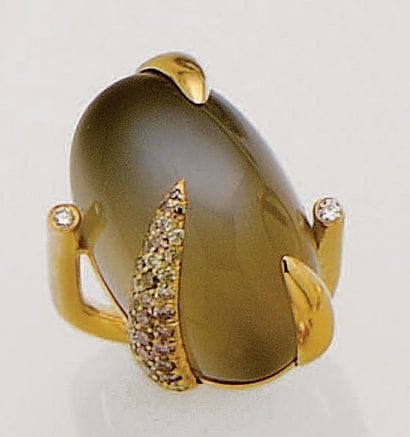 ANN GERARD
Bague en or jaune 18K (750/oo)...