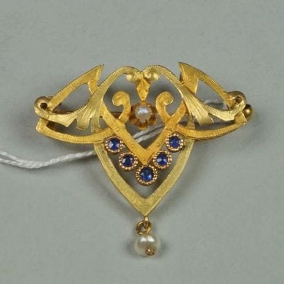 Broche ancienne en or jaune 18K (750/oo)...