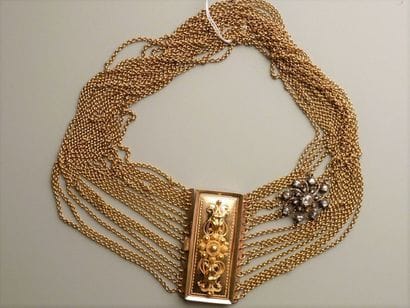 Collier en or jaune 18K (750/oo) composé...