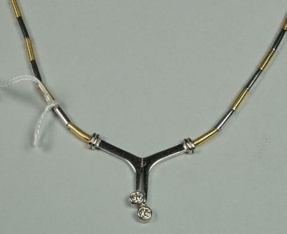 Collier en or 18K (750/oo) de deux tons à...