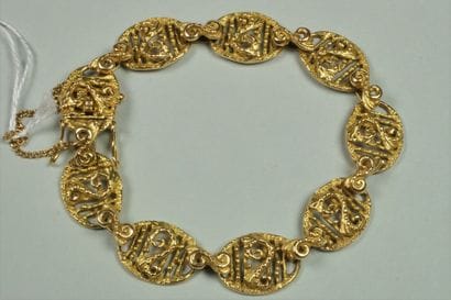 Bracelet ancien en or jaune 18K (750/oo)...