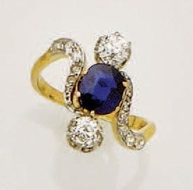Bague en or jaune 18K (750/oo) et platine...