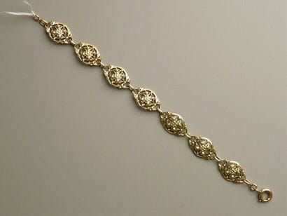 Bracelet ancien en or jaune 18K (750/oo)...