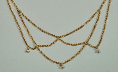 Collier draperie en or jaune 18K (750/oo)...