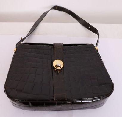VINTAGE LEATHER HANDBAG

Brown crocodile...