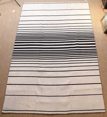 KILIM RUG with black stripes on a beige background

Modern...