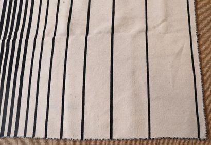 KILIM RUG with black stripes on a beige background

Modern...