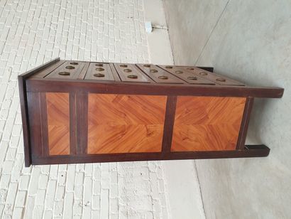 A LOUIS XVI CHIFFONIER IN ROSEWOOD AND AMARANTH...
