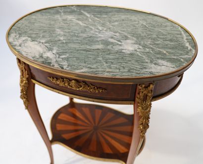 A small veneer middle table with an oval...