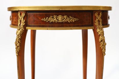 A small veneer middle table with an oval...