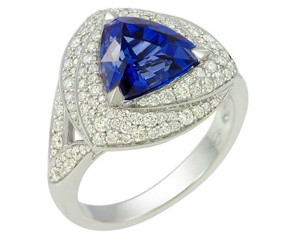 White gold ring centered on a sparkling royal...