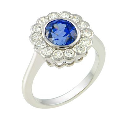 White gold ring set with an oval Natural...
