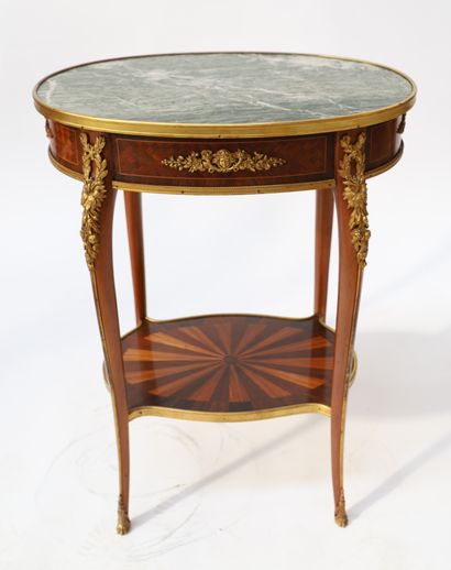 A small veneer middle table with an oval...