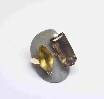 Yellow gold ring set with 2 smoky quartz,...