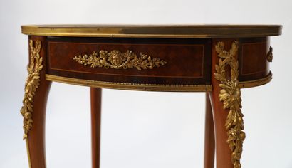 A small veneer middle table with an oval...