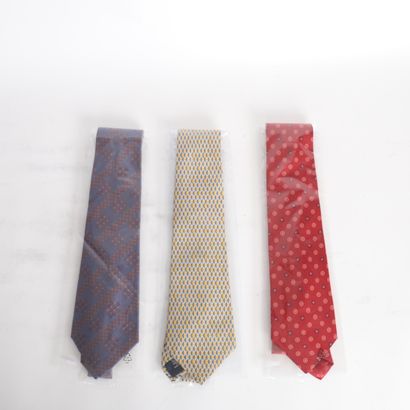 CHANEL
Set of three ties with geometric motifs,...