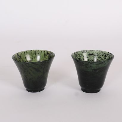 PAIR OF CHINESE GREEN JADE STONE TUMBLERS
In...