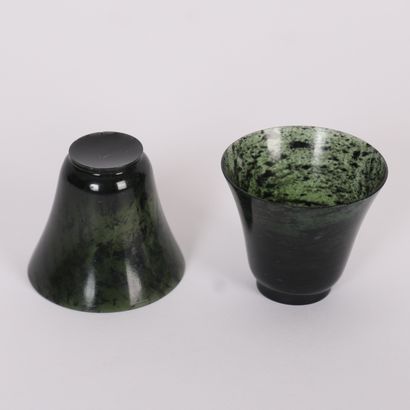 PAIR OF CHINESE GREEN JADE STONE TUMBLERS
In...