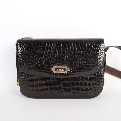 CELINE
Shoulder bag in black crocodile.
It...