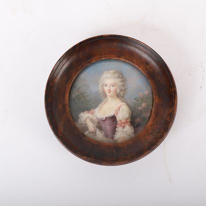 ROUND MINIATURE FRAME, YOUNG WOMAN 
In the...