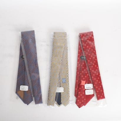 CHANEL
Set of three ties with geometric motifs,...