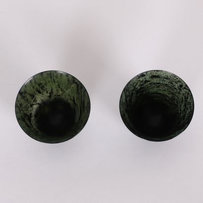 PAIR OF CHINESE GREEN JADE STONE TUMBLERS
In...