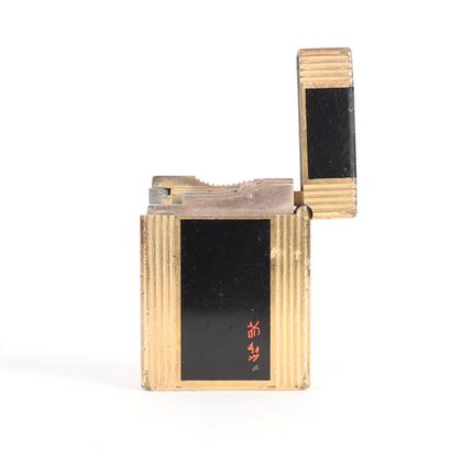 S.T.DUPONT
gilt metal lighter. Signed and...