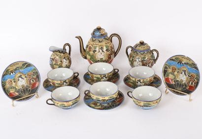 ASIAN DECOR TEA SERVICE
Includes 6 cups,...