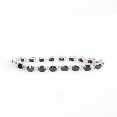 SILVER BRACELET WITH BLUE STONES
Silver bracelet,...