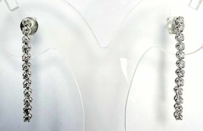 PAIR OF WHITE GOLD AND DIAMOND EARRINGS
Pair...
