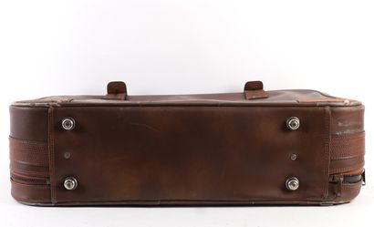 LANCEL CHOCOLATE LEATHER SUITCASE
Chocolate-colored...